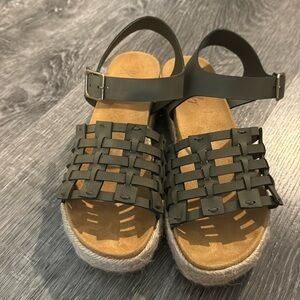 Platformed dark green sandals